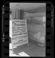 Sidewalk sign and entrance of Jewish Family Service's Valley Storefront in Los Angeles, Calif., 1981