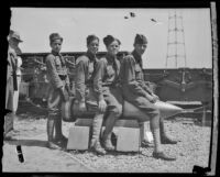 Young boys pose next to railway rifle on Army Day at Fort MacArthur, San Pedro, 1930s