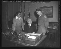 Pima Indian survivor of the Mt. Suribachi Flag-raising and Indian veteran of Bataan Death March with Los Angeles Mayor Fletcher Bowron