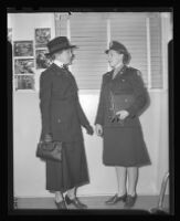 Two women talking, both wear military uniforms, Los Angeles, 1944