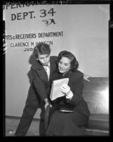 Twelve-year-old Dean Stockwell and Colleen Townsend waiting at court for contract approval in Los Angeles, Calif., 1949