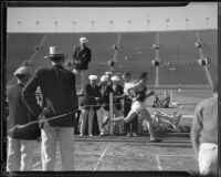 S.C. Trojan relay runner sprints through the finish line during the dual track meet against Stanford, Los Angeles, 1934