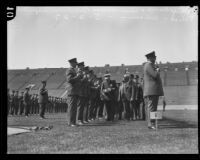 Chief Davis and Commissioner Birnbaum inspect police at Los Angeles Memorial Coliseum, Los Angeles, 1927