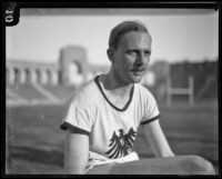 Otto Peltzer, German world record holder in the 880, relaxes at the Coliseum while training to race, Los Angeles, 1928