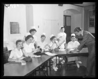 Nurses answering phones, California Hospital, Los Angeles, 1956
