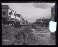 San Fernando Boulevard covered in debris from flooding caused by heavy rains, Burbank, 1928