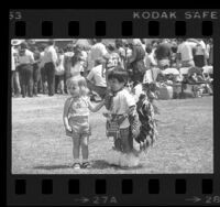 Two-year-olds, Michelle Bube, and Michael Ortiz at American Indian Scholarship Fund raising cookout in Los Angeles, Calif., 1976