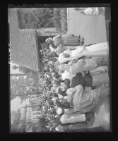 Mourners gather outside of Alhambra funeral chapel at services for Kathy Fiscus, who died after falling into a San Marino well. A. 1949