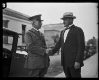 Major General James H. McRae shakes hands with his son Lieutenant Colonel Donald M. McRae, Los Angeles, 1926