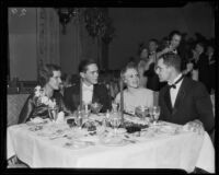 Roberta Von Kleinsmid, Jack Rendlar, Marguerite Blake, and Jack Erdley attend a party at the Bel Air Bay Club, Pacific Palisades (Los Angeles), 1933-1935