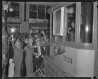 Railway strikers and protesters react to “loyal workers” operating street cars, Los Angeles, 1934