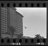 Helicopter flies near Century Plaza Hotel before President Johnson's arrival, 1967