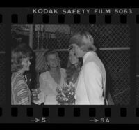 Norman Chandler (groom) with Jane Emilie Yeager (bride) and his mother Marylin Brant (center-left) after wedding, 1976