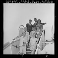 Senator John F. Kennedy with brother Robert, sister Eunice Shriver, leave by plane, Los Angeles, Calif., 1960