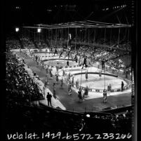 Aerialists and clowns performing in Ringling Bros. and Barnum & Bailey show, Los Angeles, Calif., 1966