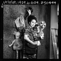 Doris Derby displaying dolls and other items made by the Poor People's Corp. of Mississippi, 1969