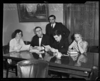 Representatives from Angelus Temple with city officials during an investigation into of misuse of funds, Los Angeles, 1932