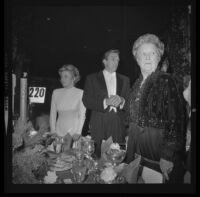 Otis Chandler (center) with with Marilyn Brant (left) and mother Dorothy Chandler at Las Madrinas Ball, 1973