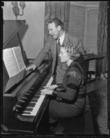 Boxer Jimmy McLarnin sings while his wife, Lillian, plays the piano, Beverly Hills, 1936