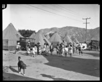 Children gathered in front of tents after the failure of the Saint Francis Dam and resulting flood, Santa Clara River Valley (Calif.), 1928