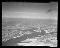 Aerial view looking east towards Los Angeles from San Pedro- Los Angeles Harbor, Calif., 1974