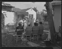 Bishop Cantwell providing confirmation at a tubercular rest home, La Puente, 1935
