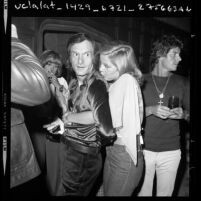 Hugh Hefner with Lenka Norakova during party at Playboy Mansion in Los Angeles, Calif., 1973