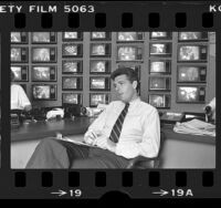 ABC producer Jeff Ruhe in his Hollywood, Calif. control center that contains 77 TV sets, 1984