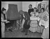 Don Eugenio Plummer lights the first fire in the new Clubhouse at Plummer Park, West Hollywood, 1938