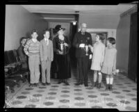 Composer John Philip Sousa and music supervisor Kathryn E. Stone awarding trophies to music students, Los Angeles, 1926