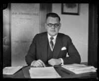 Dr. Lokrantz sitting at his desk in his office, Los Angeles, 1927