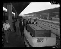 Actor Errol Flynn's coffin on Los Angeles Union Station train platform, Calif., 1959