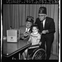 Two masons with a hospital patient inaugurate the Shriners' Amateur Radio Service Los Angeles, Calif., 1965