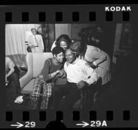 City Councilman Tom Bradley being congratulated by his daughters and wife upon winning mayoral election in Los Angeles, Calif., 1973