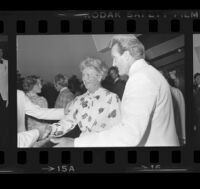 Otis Chandler, Los Angeles Times publisher, at wedding reception for son Norman, 1976