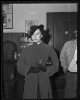 Ann Smith held for questioning after late husband's bank robbery, Los Angeles, 1936