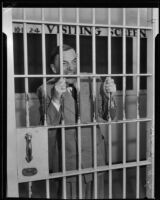 H. H. Van Loan bares his teeth in jail, Los Angeles, 1934