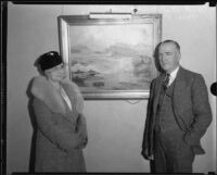 Artist Jack Wilkinson Smith standing in front of painting with Grace Blanchard, [circa 1939]