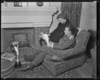 Boxer Jimmy McLarnin and his wife, Lilian, read a newspaper together, Beverly Hills, 1936