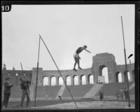 U.S.C. vaulter knocks over the bar on his pole-vault attempt during the U.S.C. and Occidental dual track meet, Los Angeles, [1926]