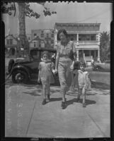 Mrs. W.E. Nickerson walking with daughters Joan and Mary, 1935