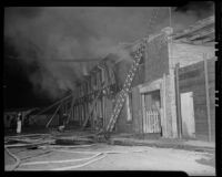 Firefighters battle flames at W. E. Bockmon Pottery and Tile Company, Los Angeles, 1935