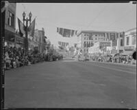 View of the Rose parade on Colorado Blvd. facing west from Marengo Ave., Pasadena, 1933