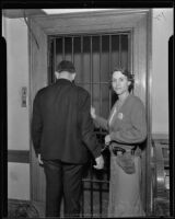 Deputy Marshal Betty Kay Smith demonstrates handling a prisoner, Los Angeles, 1935