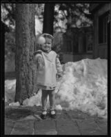 Marianne Scott throws a snowball at the camera, Lake Arrowhead, 1936