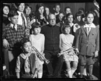 Composer John Philip Sousa with school-age musicians at Philharmonic Auditorium, Los Angeles, 1926