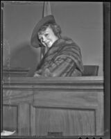 Iris Adrian, actress, in the witness stand after a divorce from Charles Henry Over, Jr., Los Angeles, 1936