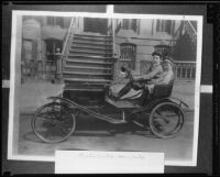 Actor Buster Keaton and Harry Keaton as children, in open car, circa 1910, rephotographed [1930s?]