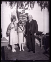 Frank A. Bouelle standing next to students from the Canoga Park High School Drum and Bugle Corps, Los Angeles, 1929