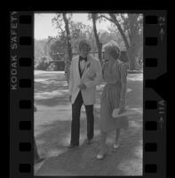 Norman B. Chandler escorts mother Marilyn Brant at wedding of brother Harry Brant, 1979